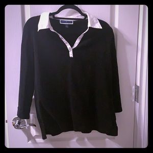 Black long sleeved top with white collar